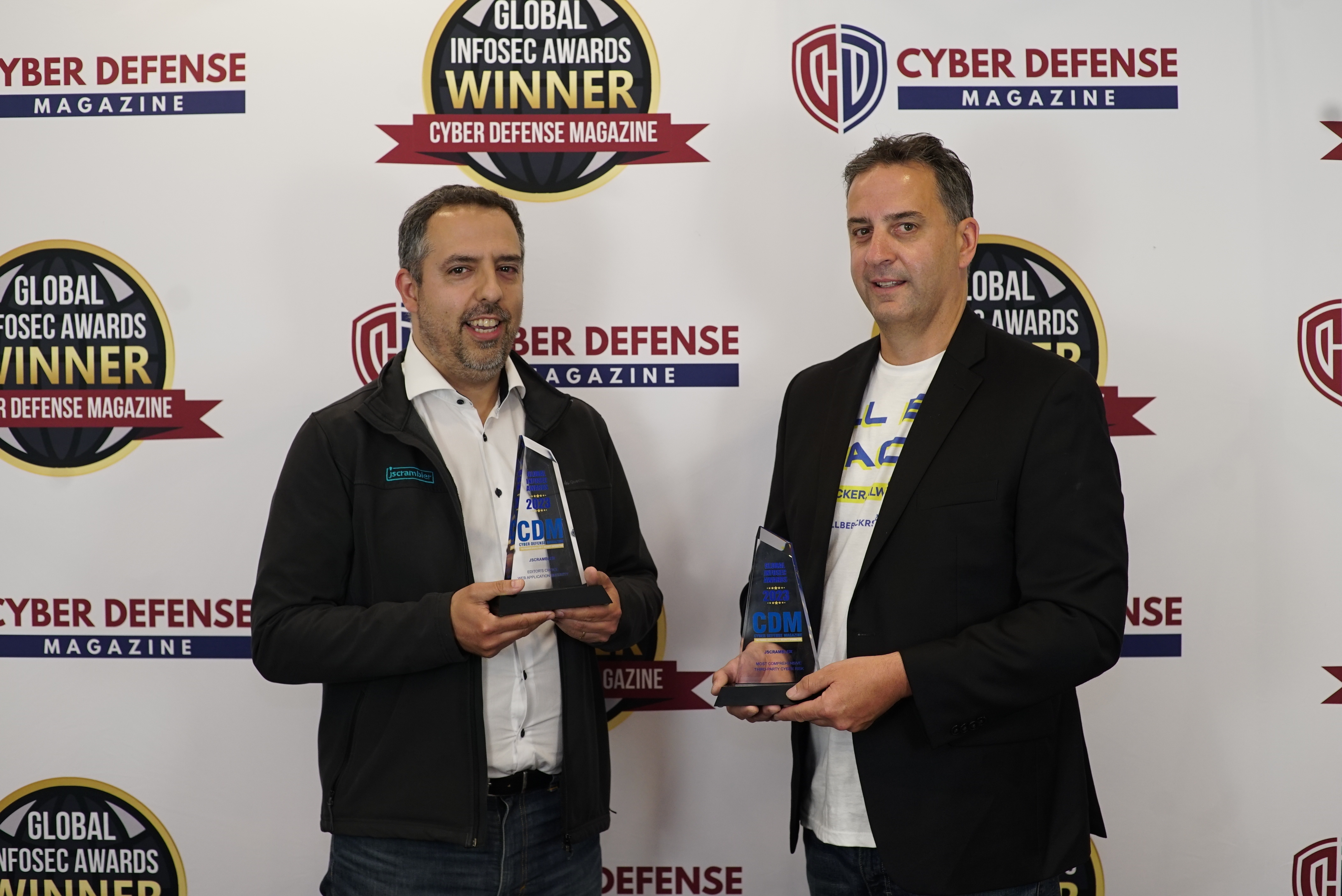 pedro fortuna e michael grant with the two cyber defense magazine awards at RSAC 2023